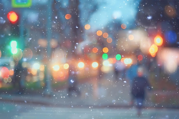 streszczenie śnieg niewyraźne tło światła miasta, ferie zimowe nowy rok