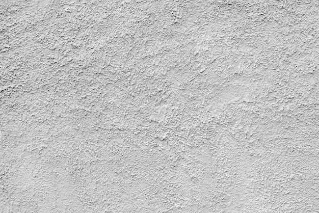 Streszczenie szorstka biała tekstura otynkowana ściana budynku