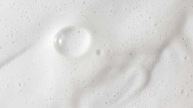 Streszczenie tło biała pianka mydlana tekstura Szampon pianka z bąbelkami