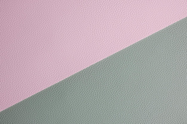 Streszczenie tło z teksturą skóry w dwóch kolorach różowym i zielonym.