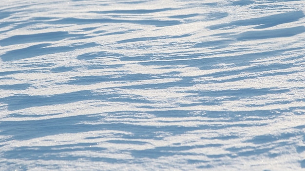 Strukturalne tekstury śniegu Zima snowy streszczenie tle Selektywne fokus