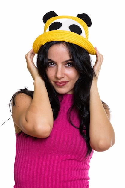 Zdjęcie strzał studio młoda piękna kobieta hiszpański kapelusz gospodarstwa