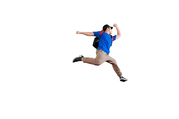 Student college'u skaczący w powietrzu ze swoją torbą