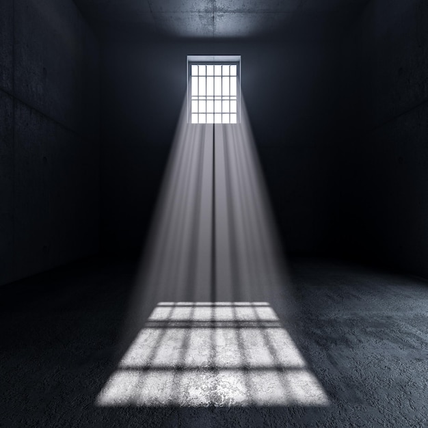 Światło więzienia pochodzące z okna z kratkami wewnątrz