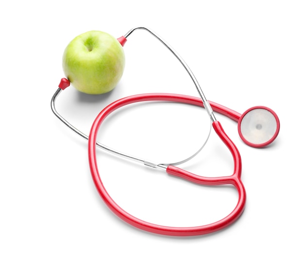 Świeże Jabłko I Stetoskop Na Białym Tle