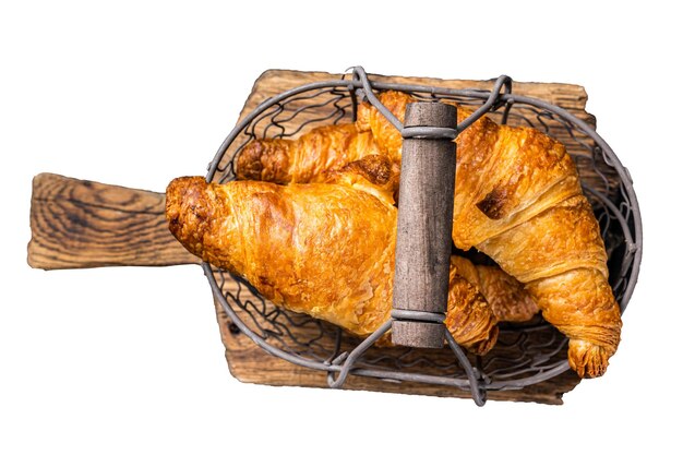 Zdjęcie Świeże pieczone croissanty na drewnianej desce do cięcia na białym tle
