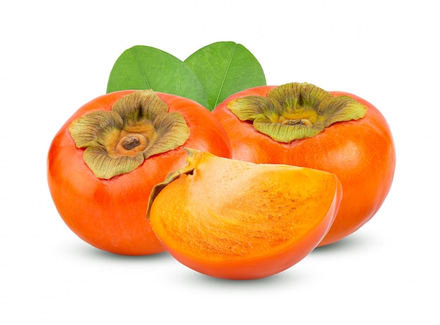 Świezi dojrzali persimmons na biel ścianie.