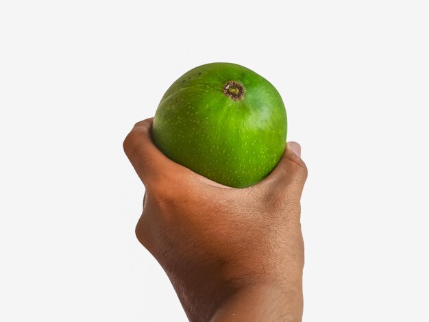 Świeży zielony miód mango izolat na białym tle
