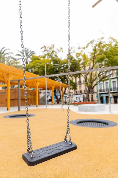 Zdjęcie swing in a park without children