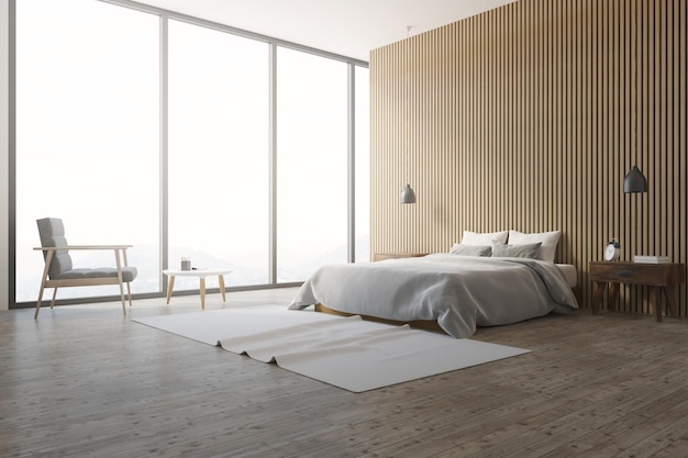 Sypialnia na strychu lub luksusowy pokój hotelowy z drewnianą podłogą i szarym łóżkiem king size.