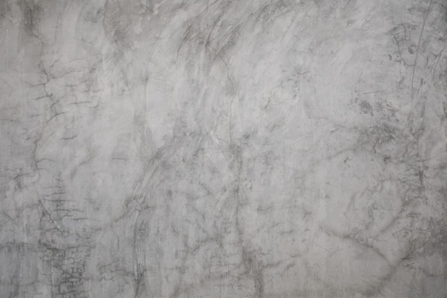 Szary betonowy mur z pęknięciem tekstury tła. Powierzchnia grunge polerowanego betonu.
