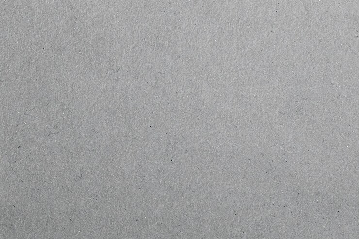 Zdjęcie szary papier z recyklingu o miękkim tle teksturowym