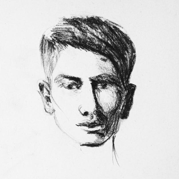 Szkic twarzy młodego faceta rysującego ręcznie czarnym ołówkiem na białym papierze Portret mężczyzny z bliska