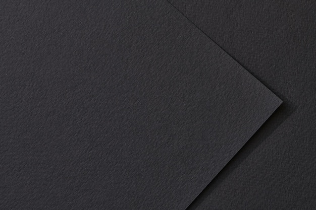 Szorstki papier pakowy kawałki tło geometryczny papier monochromatyczne tekstura kolor czarny Makieta z miejsca kopiowania tekstu