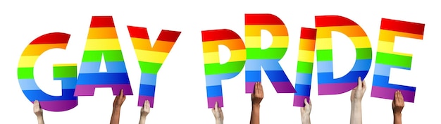 Zdjęcie sztandar dumy gejowskiej ludzkie ręce trzymające kolorowe litery