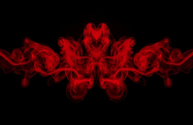 Sztuka czerwieni dymny abstrakt na czarnym tle, ciemności pojęcie