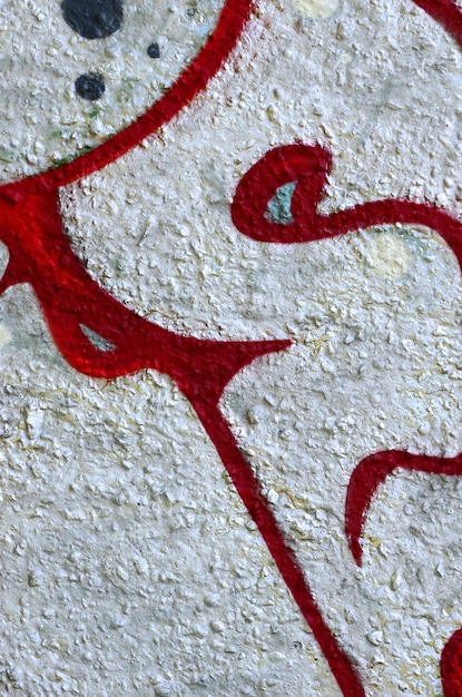 Zdjęcie sztuka uliczna abstrakcyjny obraz tła fragmentu kolorowego obrazu graffiti w chromowanych i czerwonych tonach