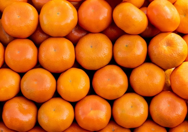 Zdjęcie tangerines owoców wypełnione ramy tła