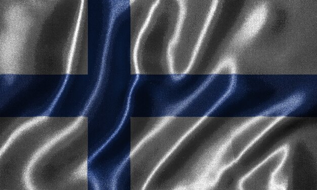 Tapeta flaga Finlandii i macha flagą przez tkaniny.