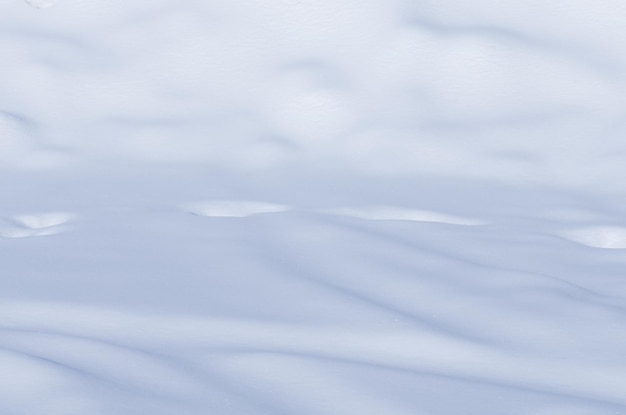 Tekstura białego śniegu Naturalne zimowe tło ze śniegiem