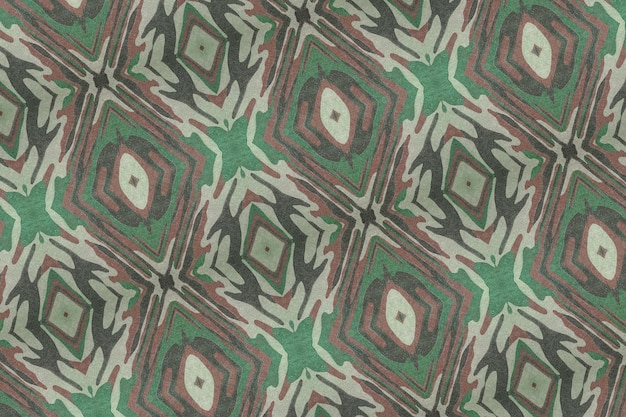 Tekstura brązowej, zielonej tkaniny bawełnianej w kamuflaż