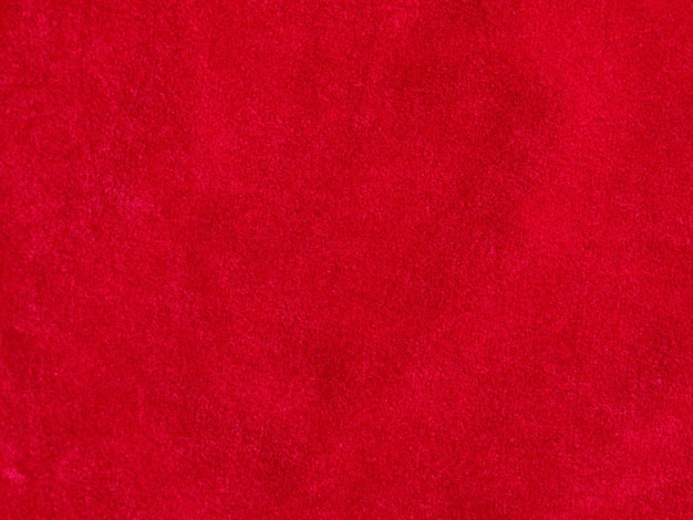 Tekstura czerwonego aksamitu używana jako tło Puste czerwone tło tkaniny z miękkiego i gładkiego materiału tekstylnego Jest miejsce na tekst