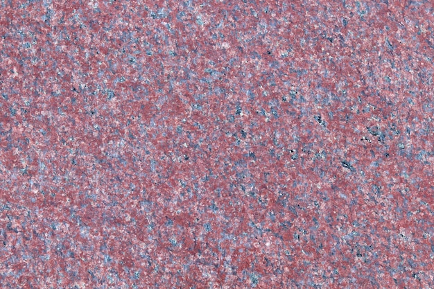 Tekstura granitowego kamienia jest bordowa Zewnętrzna podłoga i tekstura drogi z dużą ilością czerwieni