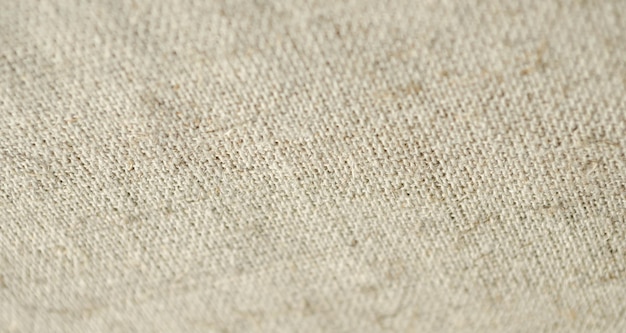 Tekstura lnianej tkaniny samodziałowej w stylu vintage