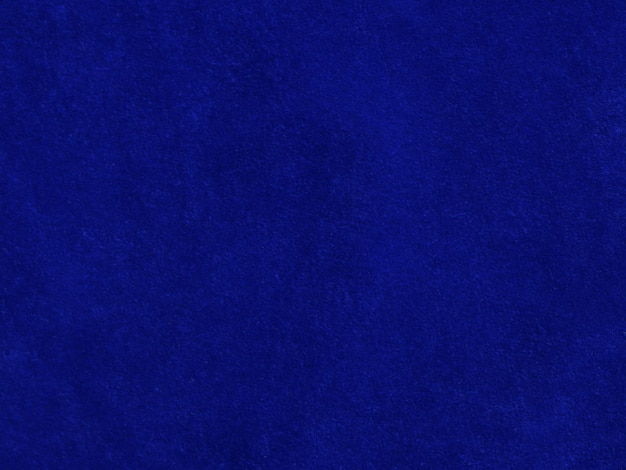 Tekstura niebieskiej aksamitnej tkaniny używana jako tło Puste niebieskie tło tkaniny z miękkiego i gładkiego materiału tekstylnego Jest miejsce na tekstx9