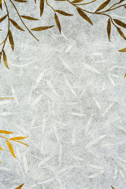Tekstura papieru morwy ze złotym i srebrnym liściem