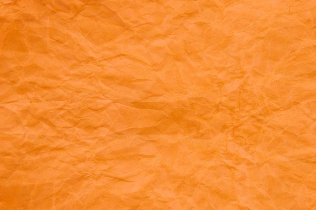 Tekstura pomarańczowego papieru zmarszczonego