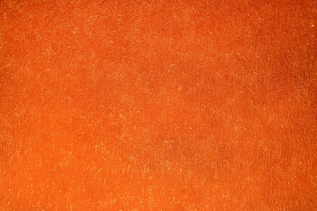 tekstura pomarańczowej tapety ściennej terakota jasny kolor
