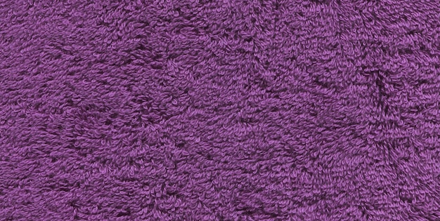 Tekstura ręcznika z włókien fioletowych Tło ręcznika kąpielowego fioletowego Tło tekstury ręcznika ultrafioletowego