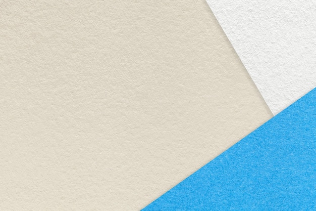 Zdjęcie tekstura rzemiosła jasnobeżowy kolor tła papieru z niebieskim i białym obramowaniem vintage streszczenie karton piasku
