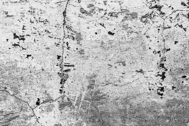 Tekstura, ściana, betonowy tło. Fragment ściany z zadrapaniami i pęknięciami