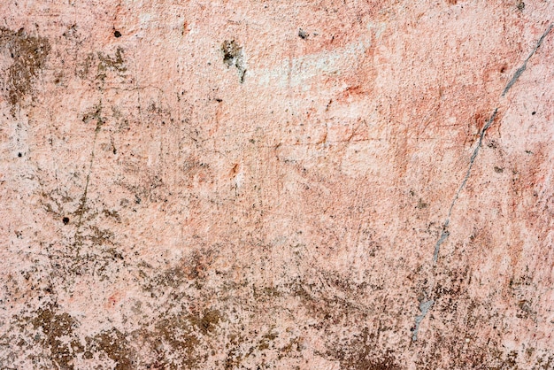 Tekstura ściany betonowe tło. Fragment ściany z rysami i pęknięciami