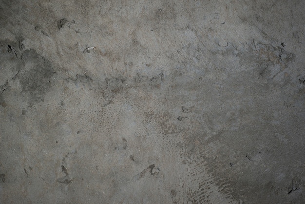 Tekstura starych szarych ścian betonowych dla tła, powierzchni i wzoru szarego cementu.