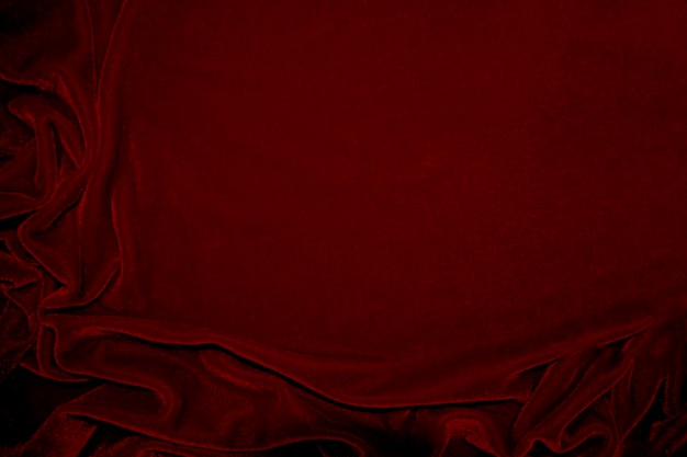Zdjęcie tekstura tkaniny czerwonego aksamitowego używanego jako tło czerwony tkanina panne tło miękkiego i gładkiego materiału włókienniczego rozdrobniony aksamit luksusowy szkarłatny dla jedwabiu x9