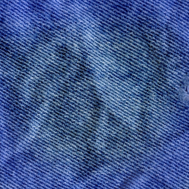 Tekstura tkaniny dżinsowej z bliska Jeans denim background
