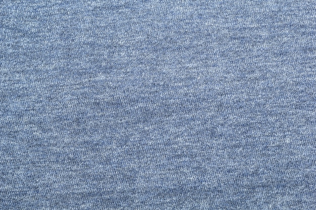 Tekstura tkaniny ma niebieski odcień.