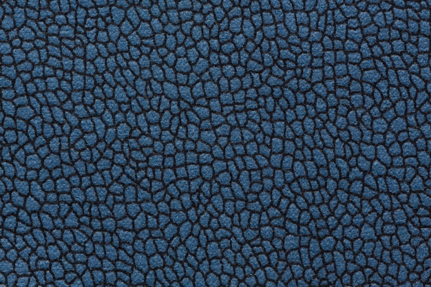 Tekstura tkaniny w kolorze niebieskim z maswerkiem