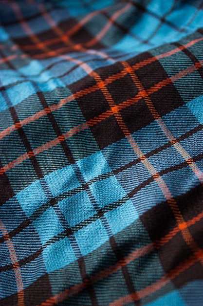 Zdjęcie tekstura tło. nowoczesny wzór kwadratowych tekstury tkaniny. niebieski szkocki materiał tekstylny
