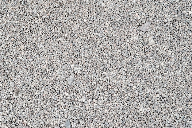 Tekstura żwiru Drobny jasnoszary granit kamień żwir Naturalne tło tekstury