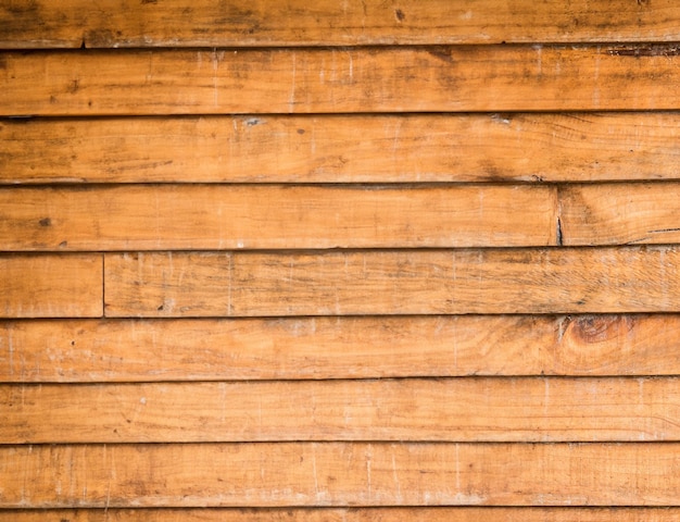 Teksturowane tło ściany z drewna o rustykalnym charakterze
