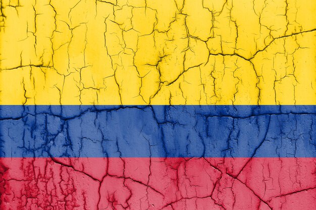 Teksturowane zdjęcie flagi Kolumbii z pęknięciami