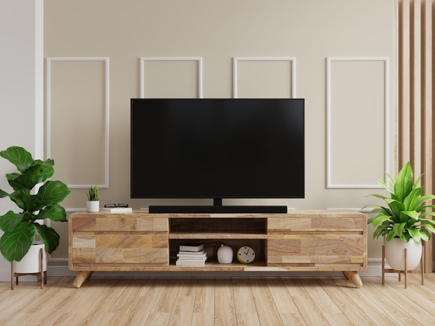 Telewizor na szafce z kremową ścianą i drewnianą podłogą. Rendering 3d