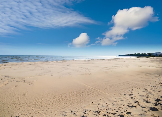 Zdjęcie tematyka piaszczystej plaży i błękitnego nieba