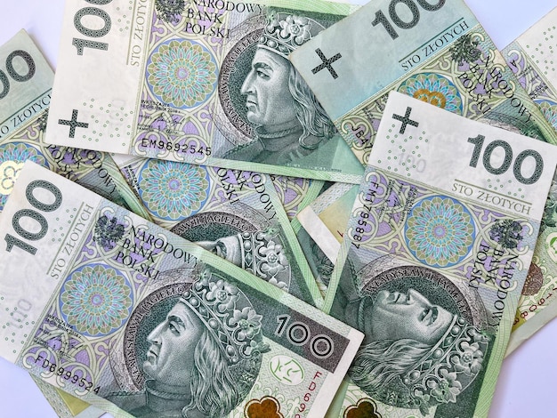 Tło banknotów sto złotych. Faktura banknotów stuzłotowych. Waluta Polski