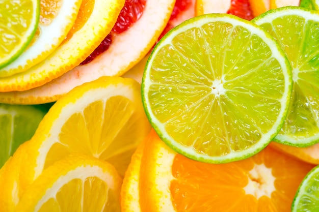 Tło cytrusowe - limonka, cytryna, pomarańcza, grejpfrut