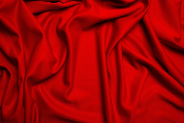 Tło czerwone jedwabne tkaniny złożone